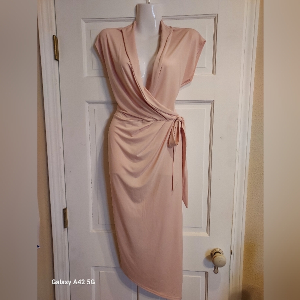 Never Worn: Wrap around pink mid length dress.